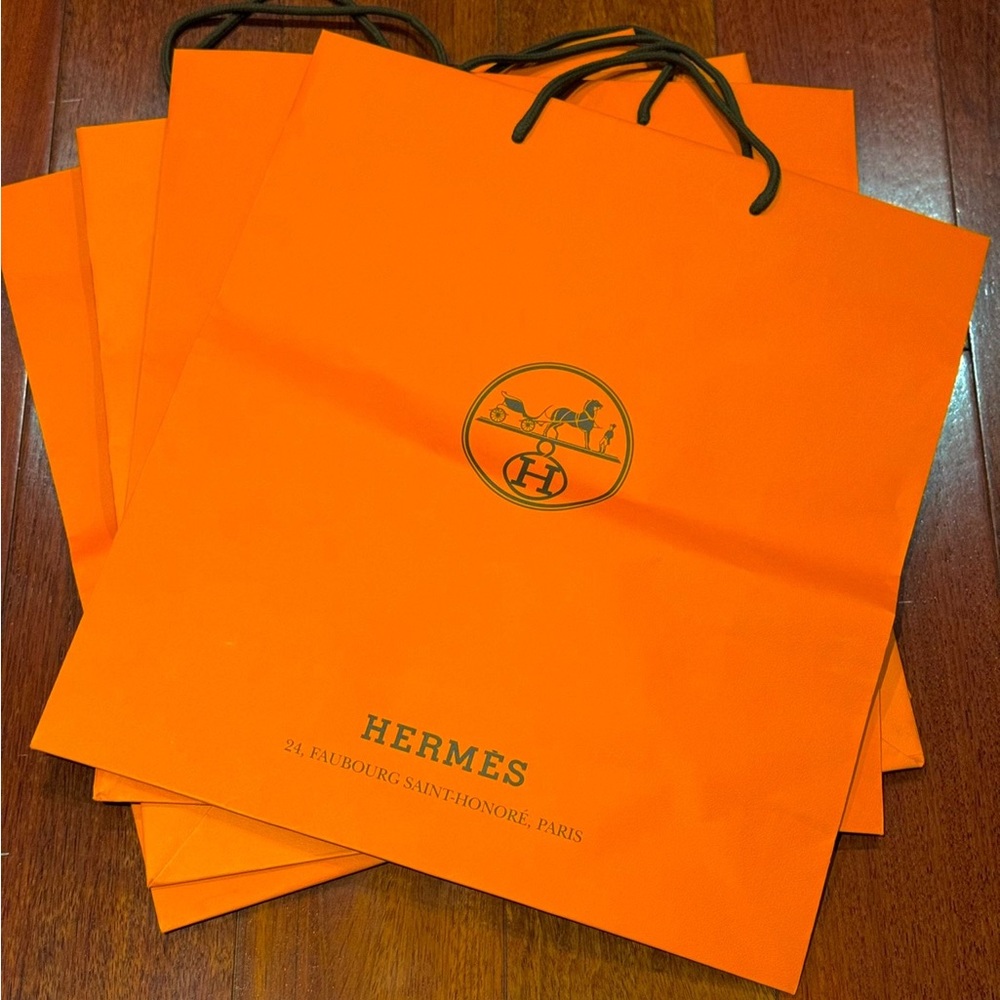Hermes paper bag medium 16.5”W x 18”L.